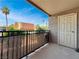 A patio with desert landscaping and mature palm trees visible in the neighborhood at 4943 Indian River Dr # 133, Las Vegas, NV 89103