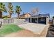 This backyard offers a large patio area, small grass area, and privacy fence at 5417 Eastbrook Dr, Las Vegas, NV 89142