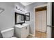Stylish bathroom featuring modern fixtures, sleek black framed mirrors and plenty of storage at 5417 Eastbrook Dr, Las Vegas, NV 89142