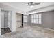 Bedroom features a large mirrored closet, neutral carpet, ceiling fan, and plantation shutters at 5417 Eastbrook Dr, Las Vegas, NV 89142