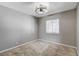 Bedroom featuring a window and modern ceiling fan at 5417 Eastbrook Dr, Las Vegas, NV 89142