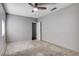 This bedroom features neutral walls, carpeted floors, and ceiling fan at 5417 Eastbrook Dr, Las Vegas, NV 89142