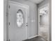 Elegant entryway with a decorative glass door and views into adjacent rooms at 5417 Eastbrook Dr, Las Vegas, NV 89142