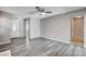 A light-filled living room featuring gray floors, neutral walls, and ample space at 5417 Eastbrook Dr, Las Vegas, NV 89142
