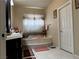 Relaxing bathroom featuring a marble tub and neutral decor at 6454 Mount Palomar Ave, Las Vegas, NV 89139