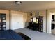 Bedroom featuring neutral colored walls, a closet with double doors and gray carpet flooring at 6454 Mount Palomar Ave, Las Vegas, NV 89139