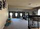 Spacious upstairs living room with lots of natural light and ample seating at 6454 Mount Palomar Ave, Las Vegas, NV 89139