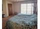 Bedroom features a large window for natural light and spacious sleeping quarters at 671 Bourbon St, Pahrump, NV 89048
