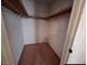 Walk-in closet features custom shelving, carpeting, and ample storage space at 671 Bourbon St, Pahrump, NV 89048