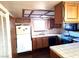 View of kitchen with tile countertops and classic appliances at 671 Bourbon St, Pahrump, NV 89048