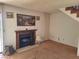 Spacious living room features a fireplace with wood trim at 671 Bourbon St, Pahrump, NV 89048