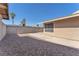 Low maintenance backyard with gravel, patio, and block wall at 6717 Sheffield Dr, Las Vegas, NV 89108
