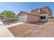 A well-maintained home featuring a spacious driveway and unique architectural design at 6717 Sheffield Dr, Las Vegas, NV 89108