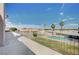 Balcony view overlooking the backyard pool, palm trees, and desert landscape at 6821 Jeanette St, Las Vegas, NV 89131