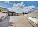 Large, gravel-covered backyard area with a utility shed, offering ample space at 6821 Jeanette St, Las Vegas, NV 89131
