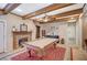 Entertainment space with a fireplace, game table, and tiled flooring with a decorative rug at 6821 Jeanette St, Las Vegas, NV 89131