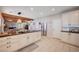 Spacious kitchen area with lots of storage, stainless steel refrigerator, and a wooden beam at 6821 Jeanette St, Las Vegas, NV 89131