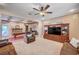 Spacious living area featuring beamed ceilings, a game table, and comfortable seating at 6821 Jeanette St, Las Vegas, NV 89131