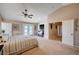 Large main bedroom with carpet flooring, ample natural light, and french door access to a balcony at 6821 Jeanette St, Las Vegas, NV 89131