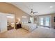 Spacious main bedroom with carpet flooring, stylish furnishings, and access to an ensuite bathroom at 6821 Jeanette St, Las Vegas, NV 89131