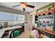 Bright office with natural light, a ceiling fan, and built-in shelving at 6821 Jeanette St, Las Vegas, NV 89131