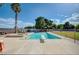 Private backyard pool with jacuzzi, diving board, and ample deck space for entertaining at 6821 Jeanette St, Las Vegas, NV 89131