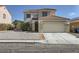 Charming two-story home with a two car garage and desert landscaping at 7382 Elbridge Way, Las Vegas, NV 89113
