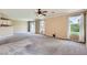 Spacious living room with large windows offering plenty of natural light at 7382 Elbridge Way, Las Vegas, NV 89113