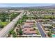 A tranquil neighborhood with lush trees, this home includes a sparkling pool, solar panels, and desert landscaping at 7408 Via Fiorentino St, Las Vegas, NV 89131