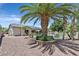Private backyard oasis with a sparkling pool, spa, and lush landscaping, ideal for outdoor living at 7408 Via Fiorentino St, Las Vegas, NV 89131