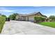Long driveway leading to a multi-car garage, providing ample parking at 7408 Via Fiorentino St, Las Vegas, NV 89131