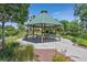 Charming gazebo with seating, set within a lush and well-maintained community park at 7408 Via Fiorentino St, Las Vegas, NV 89131