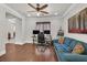 Home office features hardwood flooring, calming decor, and bright natural light at 7408 Via Fiorentino St, Las Vegas, NV 89131
