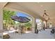 Enjoy outdoor cooking on this patio with built in barbeque and bar top at 7408 Via Fiorentino St, Las Vegas, NV 89131