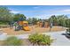 Bright and cheerful community playground with modern equipment, creating a fun and safe environment for children at 7408 Via Fiorentino St, Las Vegas, NV 89131