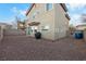 Backyard featuring rock landscaping, perfect for outdoor entertaining and relaxation at 8036 Eurostar St, Las Vegas, NV 89131
