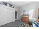 Well-lit bedroom featuring ample storage and playful dinosaur decorations at 8036 Eurostar St, Las Vegas, NV 89131