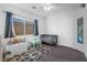 Cozy bedroom featuring a crib, window, and playful dinosaur décor at 8036 Eurostar St, Las Vegas, NV 89131