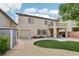Backyard with artificial turf, gravel, patio, and storage shed at 8224 Fowler Falls Ct, North Las Vegas, NV 89085
