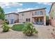 Large backyard with patio, perfect for outdoor dining and relaxation at 8224 Fowler Falls Ct, North Las Vegas, NV 89085