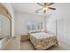 Bedroom with a window view and traditional furniture and a ceiling fan at 8224 Fowler Falls Ct, North Las Vegas, NV 89085
