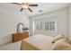 Bedroom with multiple windows and natural lighting and traditional furnishings at 8224 Fowler Falls Ct, North Las Vegas, NV 89085