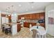 Spacious kitchen with breakfast nook, stainless appliances, and granite countertops at 8224 Fowler Falls Ct, North Las Vegas, NV 89085