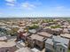Expansive view of a residential community with rooftops and neighborhood streets at 9053 Boston Springs Ave, Las Vegas, NV 89149