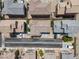 Aerial view of neighborhood homes with tidy landscaping and clear street markings at 9053 Boston Springs Ave, Las Vegas, NV 89149