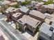 Aerial view of homes with well-maintained yards and neighborhood streets at 9053 Boston Springs Ave, Las Vegas, NV 89149