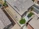 Birds-eye view of the rear of a two-story home featuring low maintenance desert landscaping at 9053 Boston Springs Ave, Las Vegas, NV 89149
