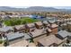 Overhead view of houses and a school with a sports field at 9053 Boston Springs Ave, Las Vegas, NV 89149
