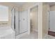 Bright bathroom featuring a glass shower and soaking tub, ideal for unwinding and relaxing at 9053 Boston Springs Ave, Las Vegas, NV 89149