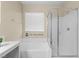 Stylish bathroom showcasing a glass-enclosed shower, soaking tub and crisp, clean design at 9053 Boston Springs Ave, Las Vegas, NV 89149